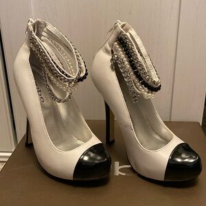 Bebe leather heels with chain and pearl accent strap